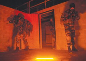 Inspect suspicious areas with the orange Impact light stick