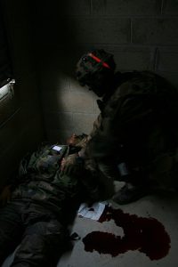 Medical triage with a red chemlight light stick