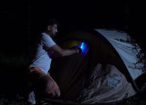 marking tent during night on campsite