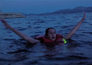 light markers on life jackets for crew members on the water