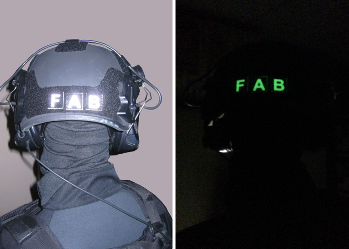 night and day identification with letters at the rear of helmet